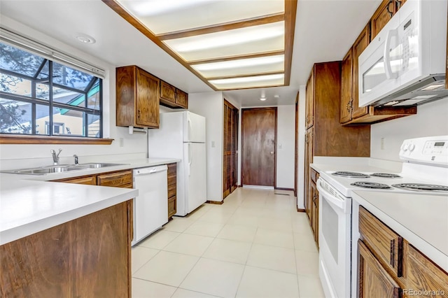 kitchen featuring sink and white appliances