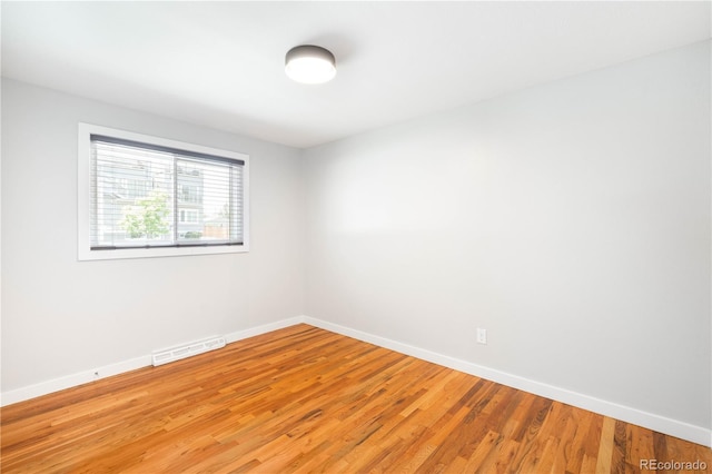 4300 Osage St, Denver, CO 80211 - spare room with baseboards and light wood finished floors