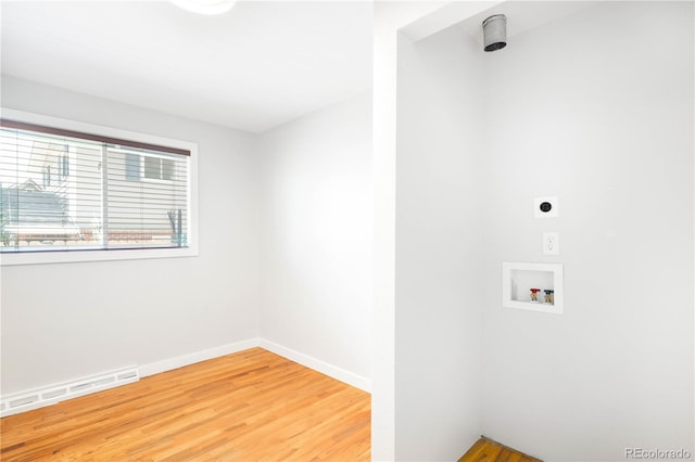 4300 Osage St, Denver, CO 80211 - laundry room featuring hookup for a washing machine, light wood-style flooring, and hookup for an electric dryer