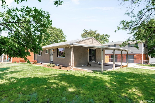 4300 Osage St, Denver, CO 80211 - back of house featuring brick siding and a patio