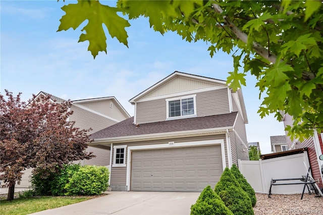 5536 Kirk St, Denver, CO 80249 - traditional-style home with a garage, concrete driveway, and roof with shingles