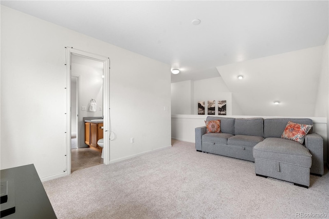5536 Kirk St, Denver, CO 80249 - carpeted living area with baseboards
