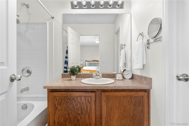 5536 Kirk St, Denver, CO 80249 - bathroom with tub / shower combination, vanity, and ensuite bath