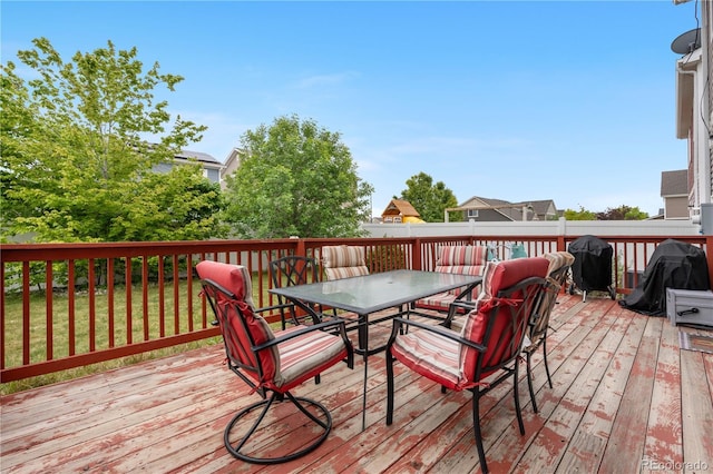 5536 Kirk St, Denver, CO 80249 - deck featuring outdoor dining area, grilling area, and a lawn