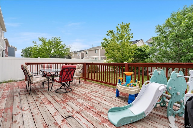 5536 Kirk St, Denver, CO 80249 - wooden terrace with outdoor dining space and a residential view