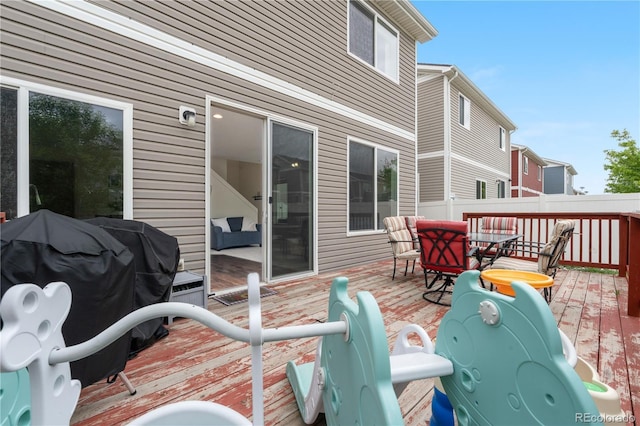 5536 Kirk St, Denver, CO 80249 - wooden terrace featuring outdoor dining space and grilling area