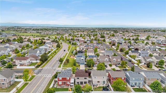 5536 Kirk St, Denver, CO 80249 - aerial view of residential area with mountains