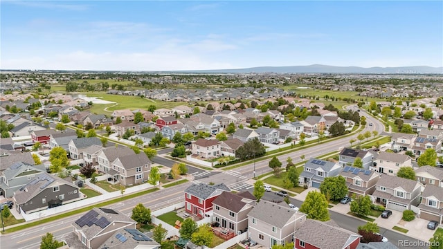 5536 Kirk St, Denver, CO 80249 - aerial perspective of suburban area with a mountainous background
