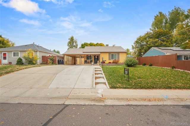 single story home with a front yard