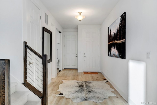 entryway with light wood-type flooring