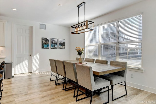 dining room featuring light hardwood / wood-style floors