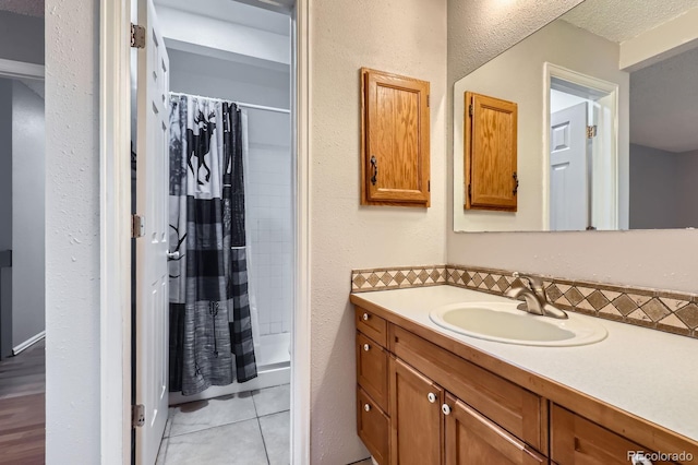 10723 Cherry Ct, Thornton, CO 80233 - bathroom featuring a shower with curtain and vanity