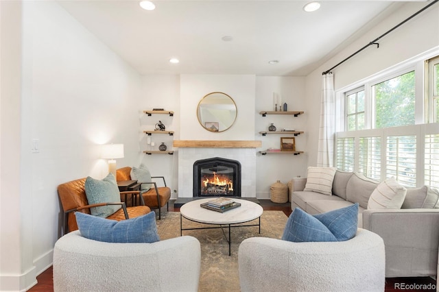623 S Logan St, Denver, CO 80209 - living area with baseboards, a fireplace, recessed lighting, and wood finished floors
