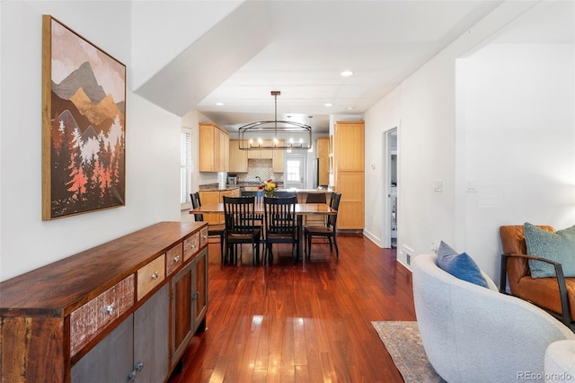623 S Logan St, Denver, CO 80209 - dining room featuring a chandelier, recessed lighting, baseboards, dark wood-type flooring, and visible vents