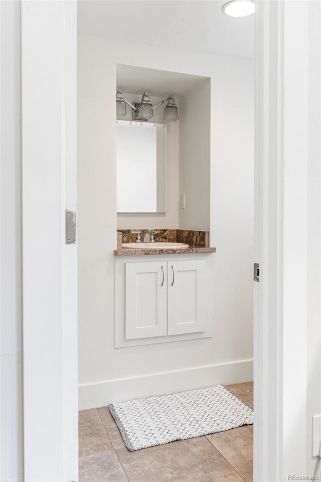 623 S Logan St, Denver, CO 80209 - bathroom featuring vanity and tile patterned floors
