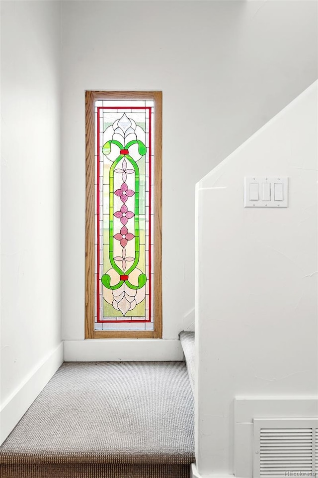 623 S Logan St, Denver, CO 80209 - stairway with carpet floors