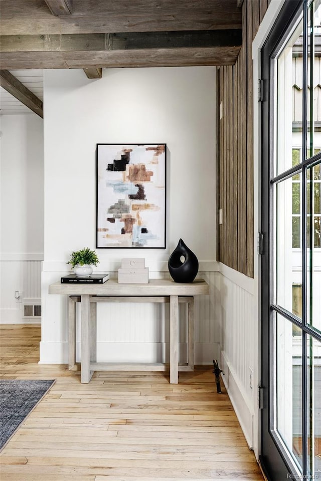 623 S Logan St, Denver, CO 80209 - detailed view of wood finished floors and a wainscoted wall