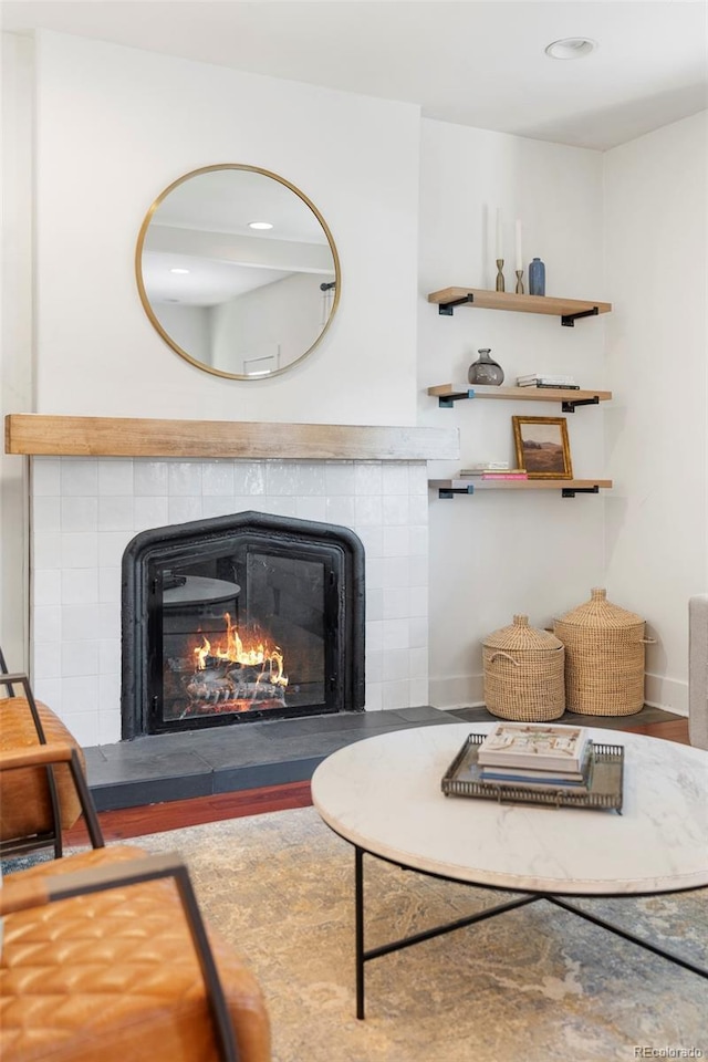 623 S Logan St, Denver, CO 80209 - living area with a tiled fireplace and recessed lighting