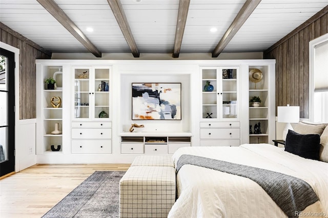 623 S Logan St, Denver, CO 80209 - bedroom with wooden walls, light wood-style floors, and a wooden ceiling with exposed beams