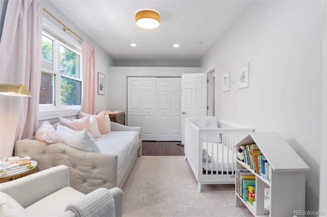 623 S Logan St, Denver, CO 80209 - bedroom featuring wood finished floors, a closet, and recessed lighting