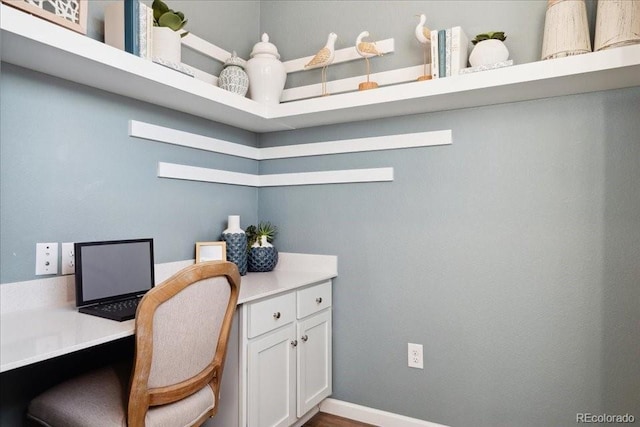 office featuring wood finished floors and baseboards
