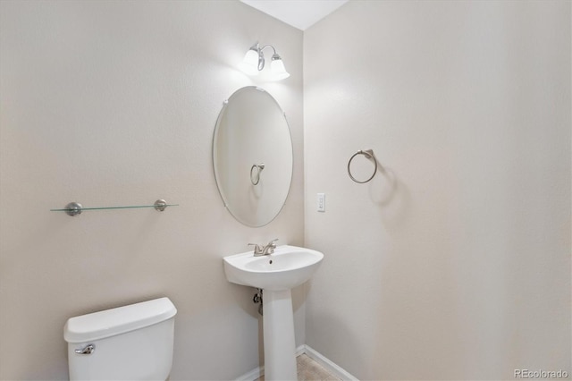 4016 S Rome St, Aurora, CO 80018 - half bath featuring toilet and baseboards