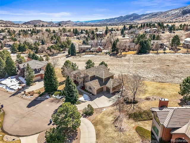 birds eye view of property featuring a residential view and a mountain view