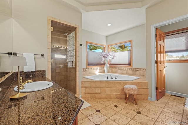 full bath featuring recessed lighting, visible vents, a shower stall, vanity, and a bath