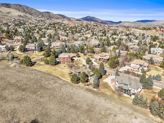 drone / aerial view with a residential view and a mountain view