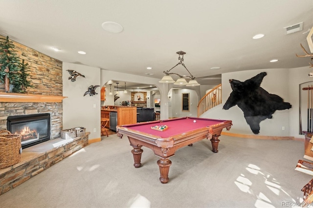 rec room with billiards, visible vents, arched walkways, light colored carpet, and a fireplace