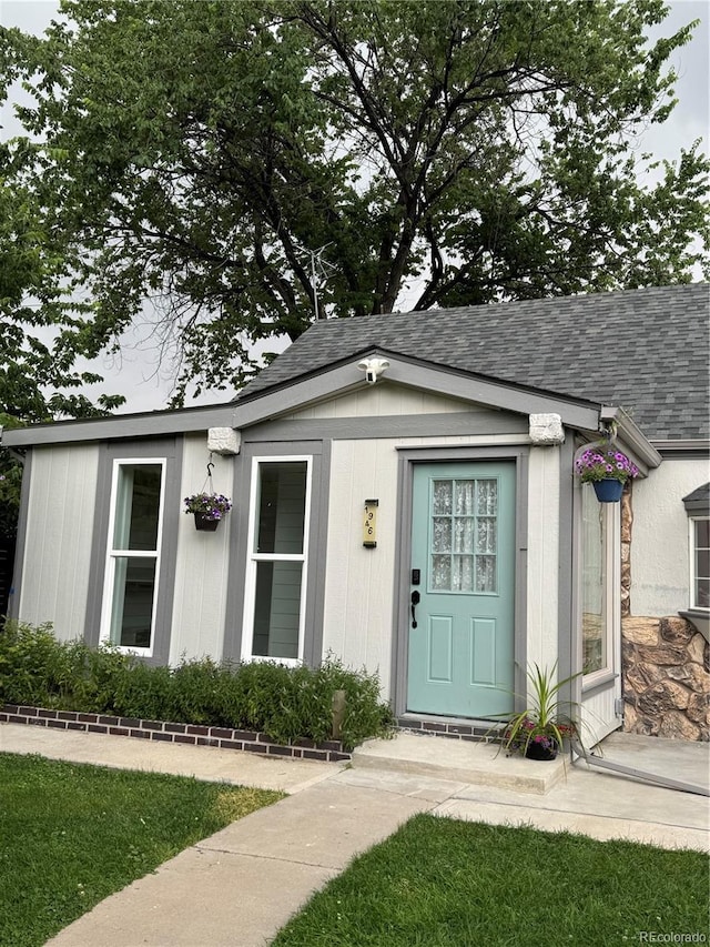 1946 Xenia St, Denver, CO 80220 - view of front of house with roof with shingles