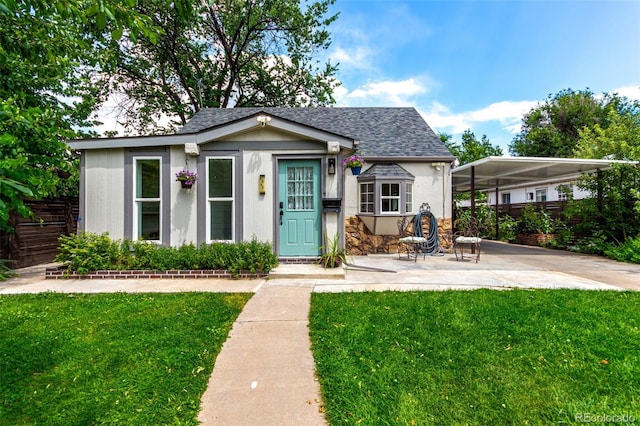 1946 Xenia St, Denver, CO 80220 - view of front of home featuring roof with shingles and stucco siding