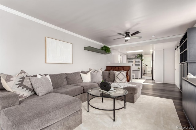 1946 Xenia St, Denver, CO 80220 - living area with wood finished floors, crown molding, and ceiling fan
