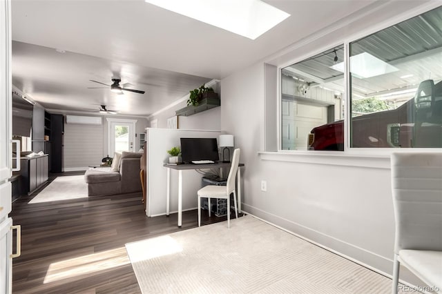 1946 Xenia St, Denver, CO 80220 - living room featuring wood finished floors, ceiling fan, and a skylight