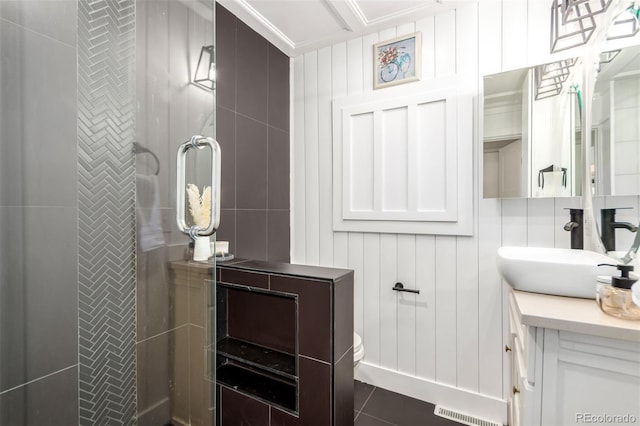 1946 Xenia St, Denver, CO 80220 - bathroom with vanity, tile patterned floors, and a shower