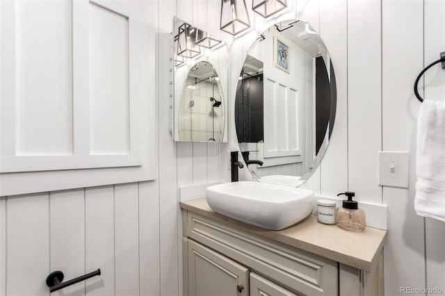 1946 Xenia St, Denver, CO 80220 - bathroom with a decorative wall and vanity