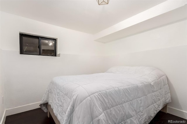 1946 Xenia St, Denver, CO 80220 - bedroom with baseboards and wood finished floors