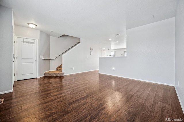 unfurnished living room with hardwood / wood-style floors