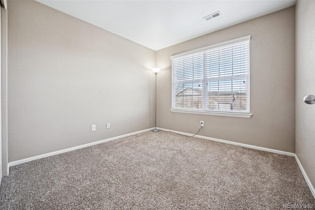 unfurnished room with carpet