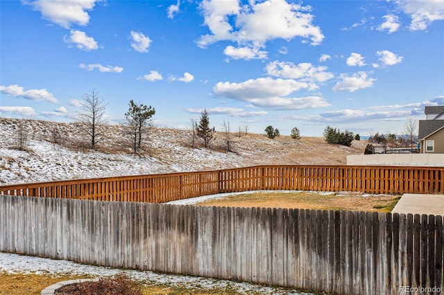 view of yard covered in snow