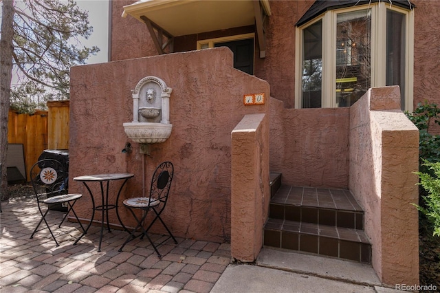 view of patio / terrace with fence