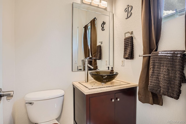 8751 Pearl St Unit J3, Thornton, CO 80229 - bathroom featuring toilet and vanity