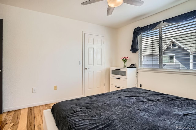 8751 Pearl St Unit J3, Thornton, CO 80229 - bedroom with light wood-style flooring and ceiling fan
