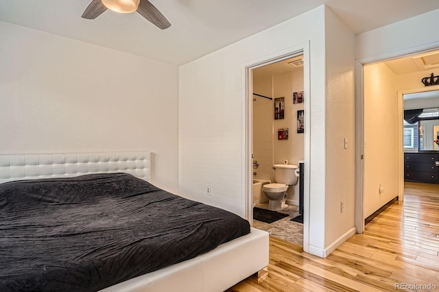 8751 Pearl St Unit J3, Thornton, CO 80229 - bedroom featuring light wood-style flooring, ensuite bath, and ceiling fan