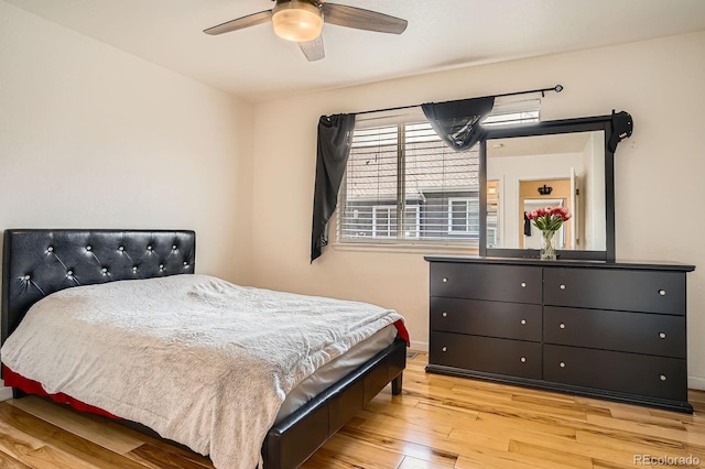 8751 Pearl St Unit J3, Thornton, CO 80229 - bedroom with wood finished floors and a ceiling fan
