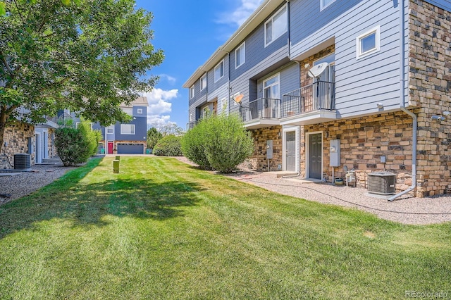8751 Pearl St Unit J3, Thornton, CO 80229 - view of grassy yard with a balcony