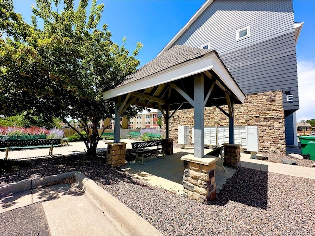 8751 Pearl St Unit J3, Thornton, CO 80229 - view of patio / terrace with mail area and a gazebo