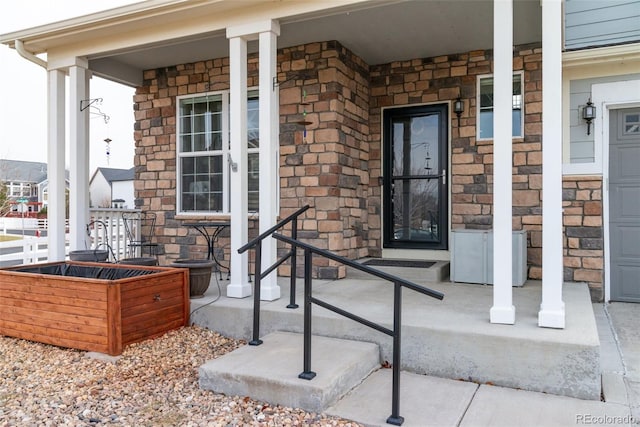 property entrance with a porch