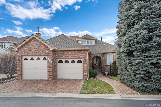 front of property with a garage