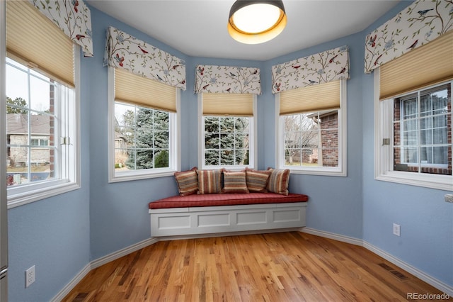 sitting room featuring light hardwood / wood-style flooring